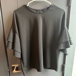 Black shirt, double ruffle sleeve